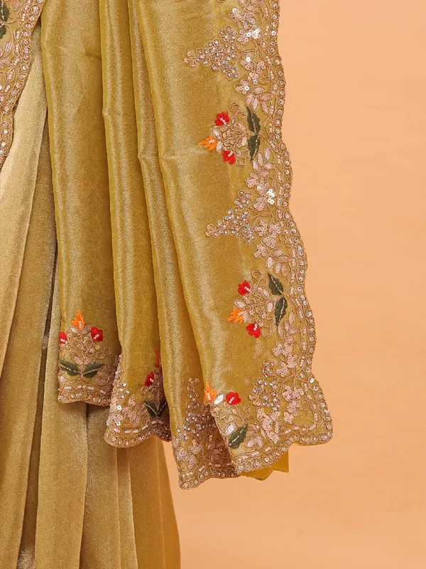 Pastel olive shimmer tissue silk saree for wedding
