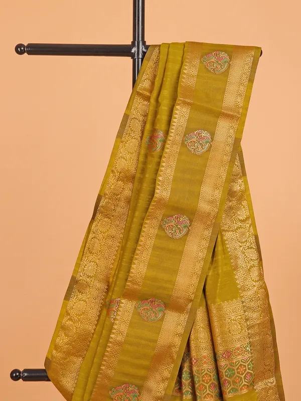 Pastel olive silk saree for festive wear