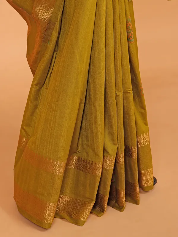 Pastel olive silk saree for festive wear
