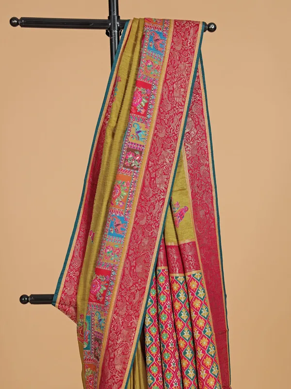 Pastel olive silk saree with zari weaving