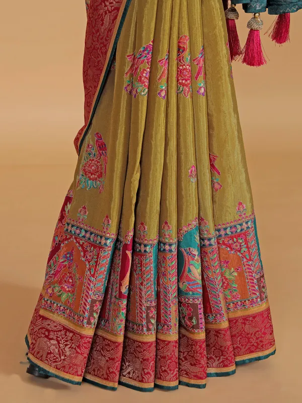 Pastel olive silk saree with zari weaving