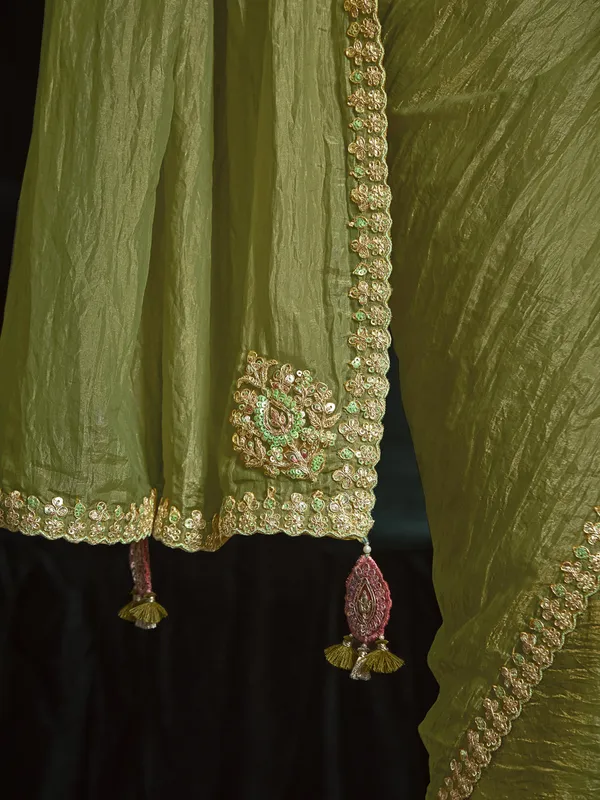 Pastel olive tissue silk saree for wedding