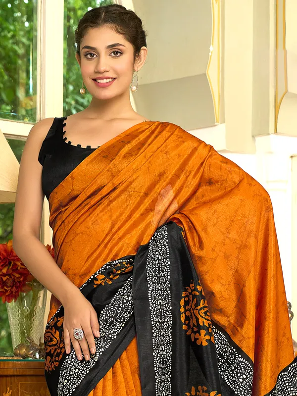 Pastel orange bhagalpuri silk saree with prints