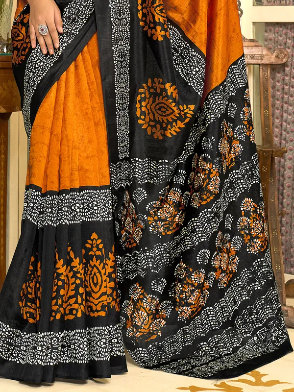 Pastel orange bhagalpuri silk saree with prints