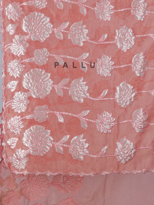Pastel orange semi tissue silk saree with zari design