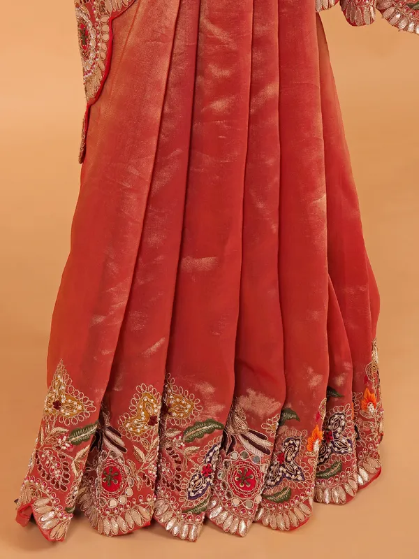 Pastel orange shimmer tissue silk wedding wear saree