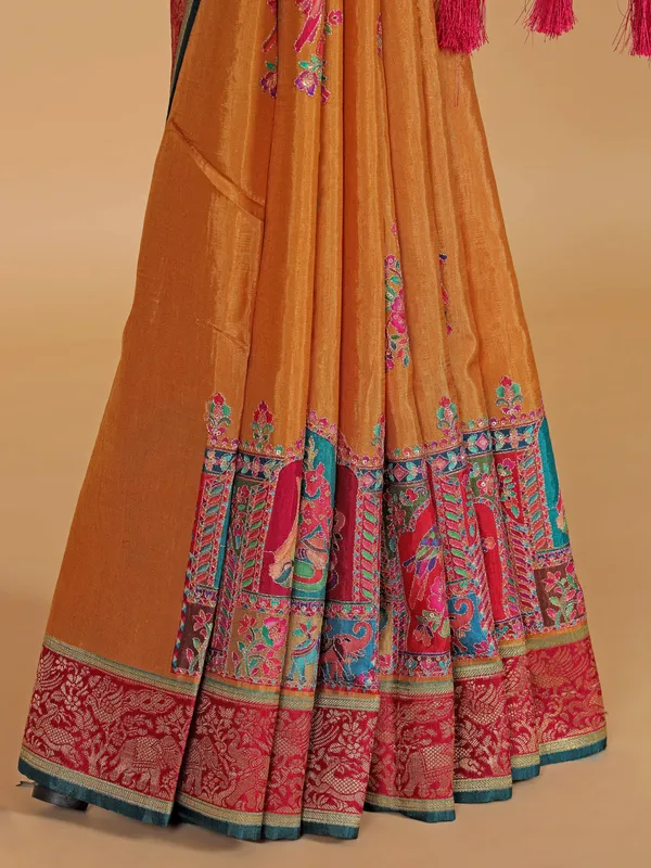 Pastel orange silk festive wear saree