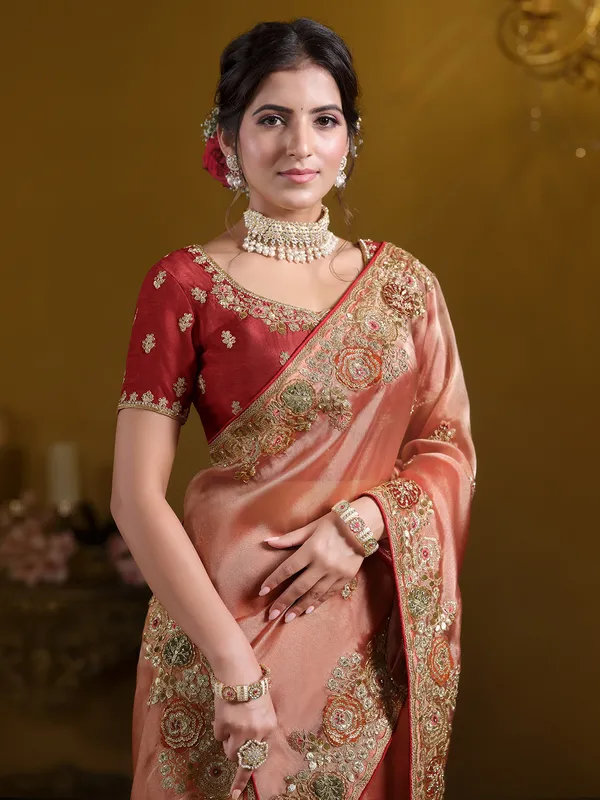 Pastel orange tissue silk saree for weddings