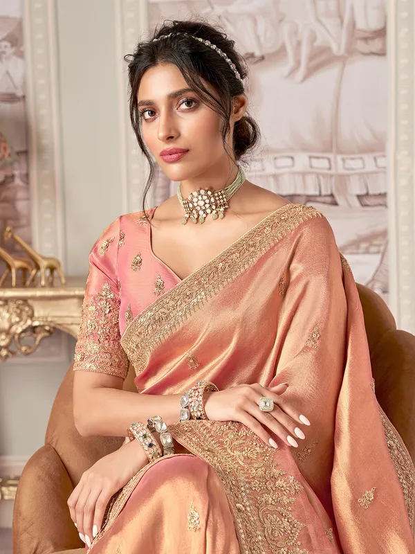 Pastel peach designer saree for celebrations