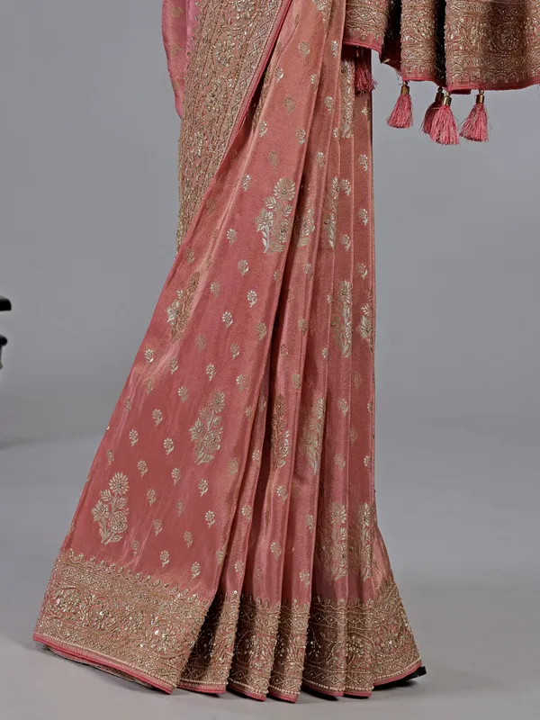 Pastel peach dola silk unstitched saree with festive detailing