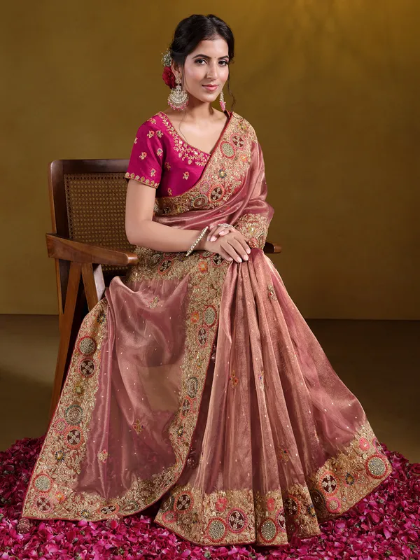 Pastel peach organza saree with zardosi work