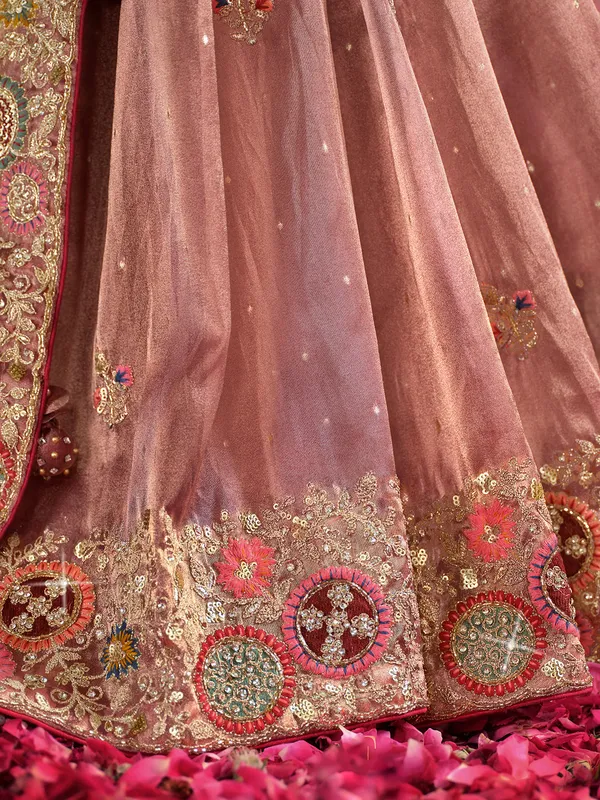 Pastel peach organza saree with zardosi work