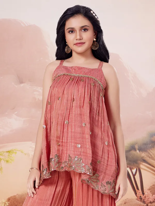 Pastel peach palazzo suit for wedding functions