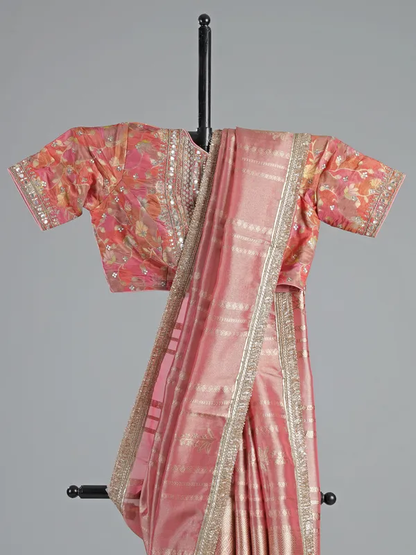 Pastel peach soft tissue saree with beaded elegance
