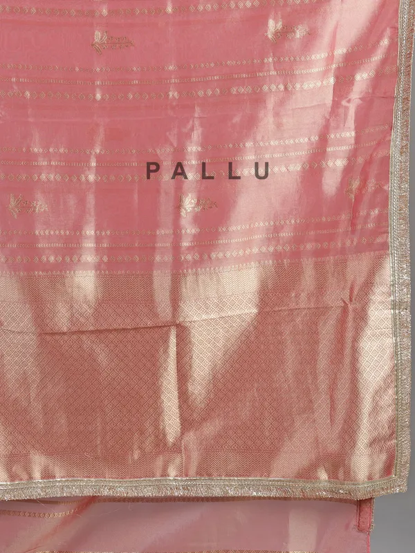 Pastel peach soft tissue saree with beaded elegance
