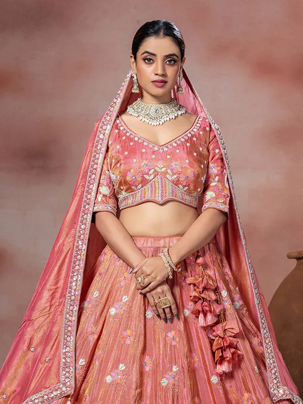 Pastel peach tissue silk lehenga choli with dupatta