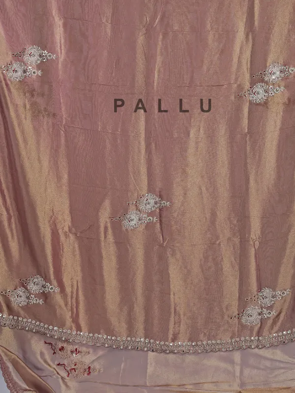 Pastel peach tissue silk saree with mirror work