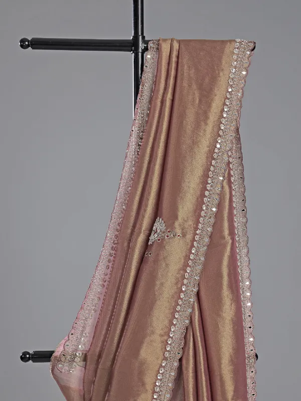 Pastel peach tissue silk saree with mirror work