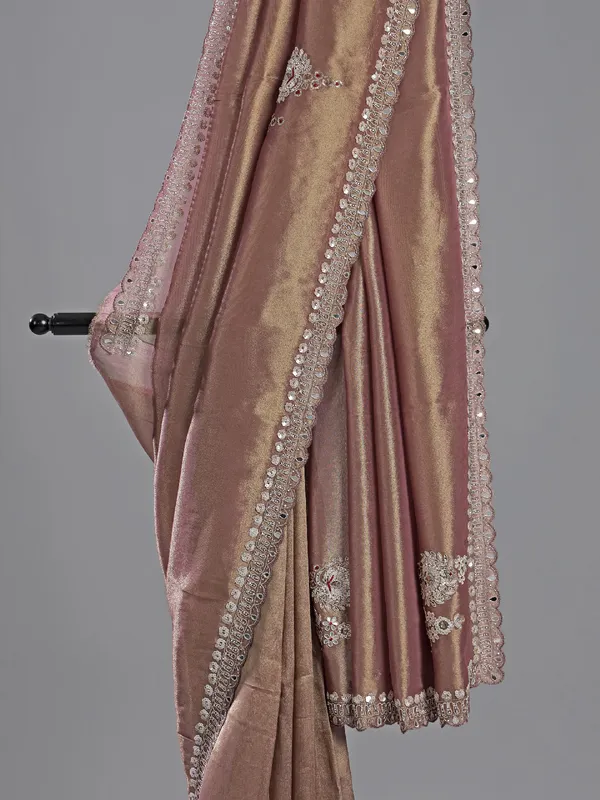 Pastel peach tissue silk saree with mirror work