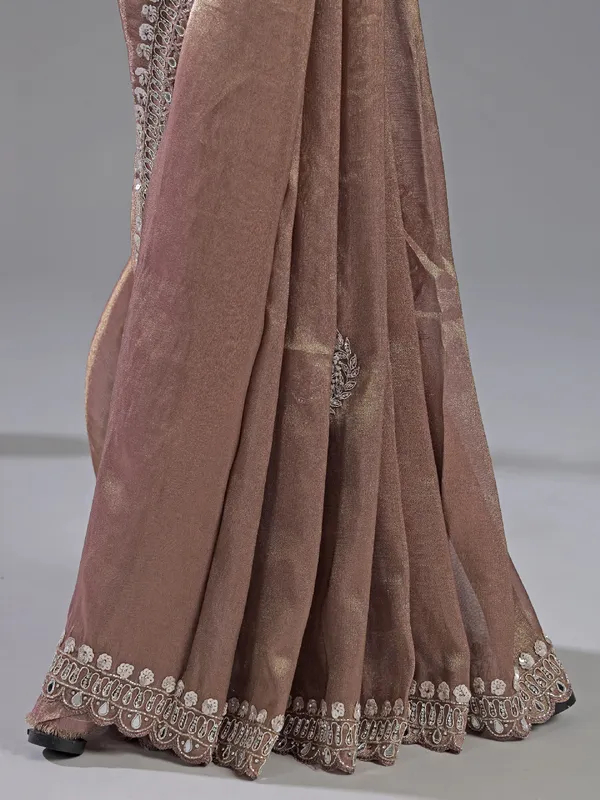 Pastel peach tissue silk saree with mirror work