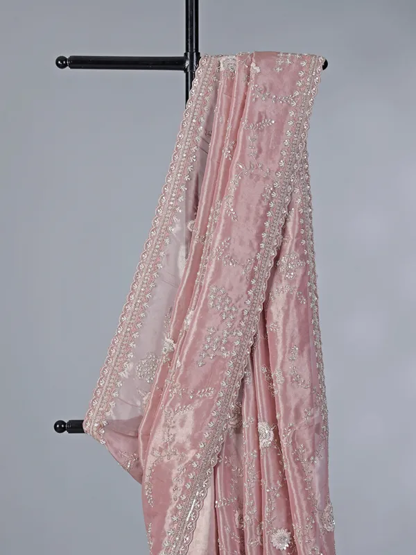 Pastel pink tissue silk saree with beads sccents