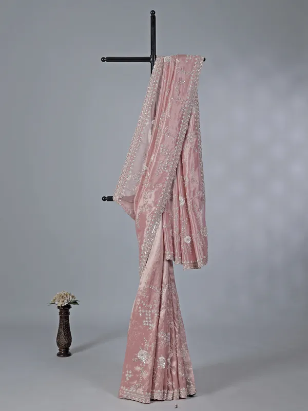 Pastel pink tissue silk saree with beads sccents
