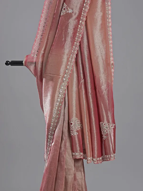 Pastel pink tissue silk saree with designer charm