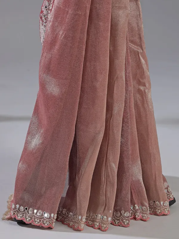 Pastel pink tissue silk saree with designer charm
