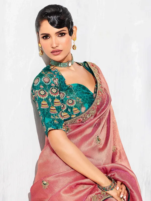 Pastel pink tissue silk saree with resham design