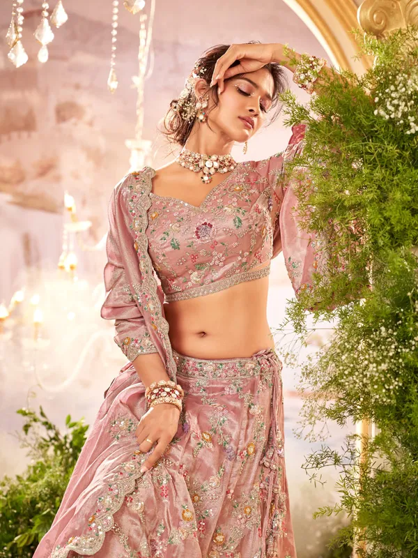 Pastel pink unstitched lehenga choli for bride