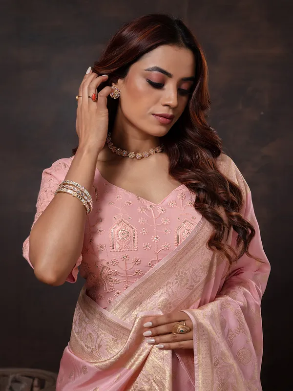 Pastel pink zari worked dola silk saree