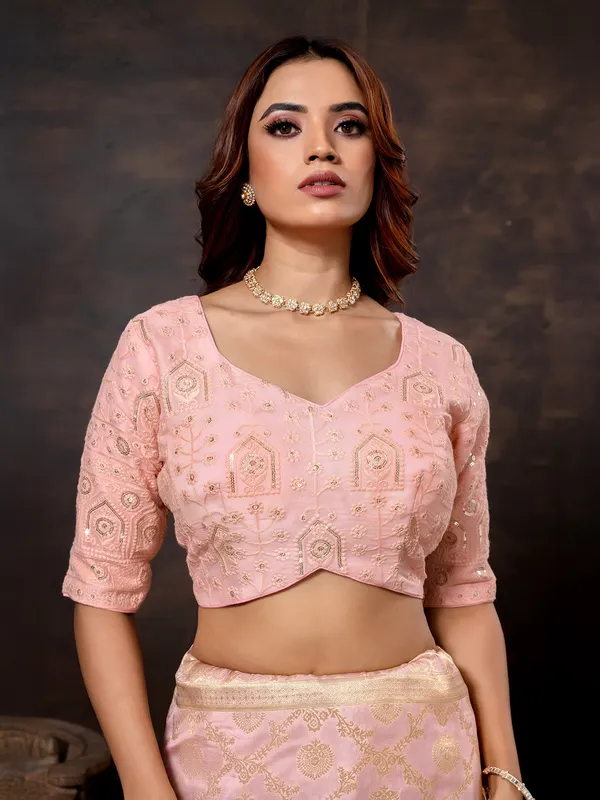 Pastel pink zari worked dola silk saree