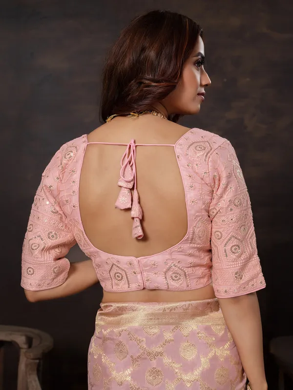 Pastel pink zari worked dola silk saree