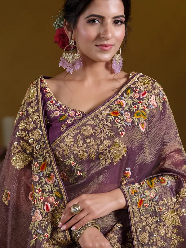 Pastel purple banarasi saree with elegant embellishments