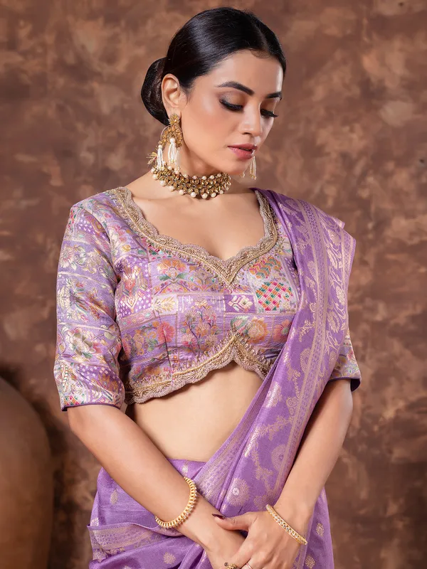 Pastel purple dola silk saree in zari weaving
