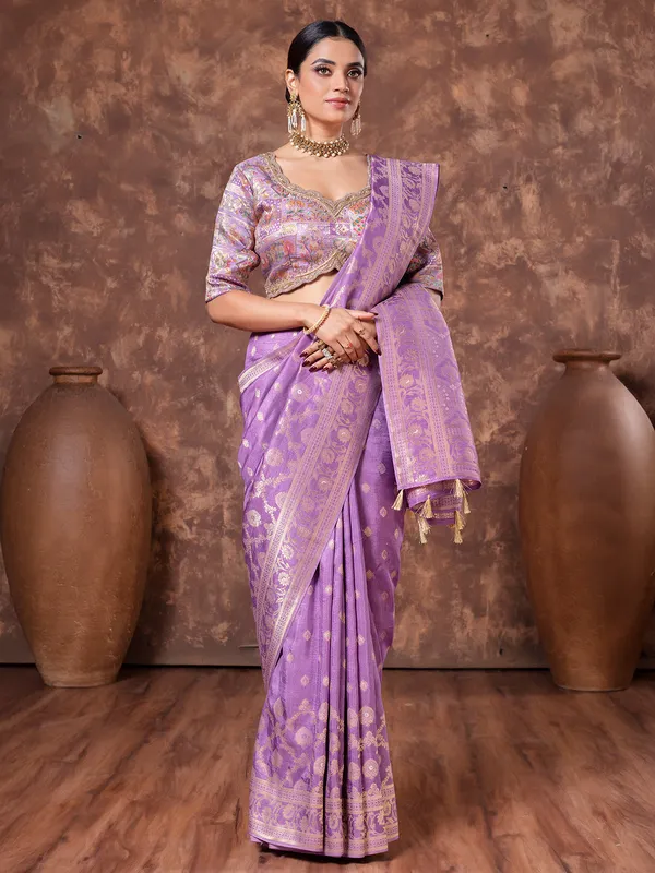 Pastel purple dola silk saree in zari weaving