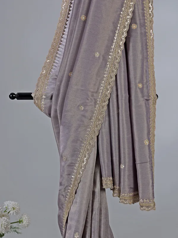 Pastel purple dola silk saree with sparkle work