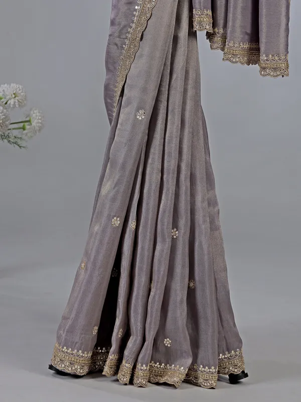 Pastel purple dola silk saree with sparkle work