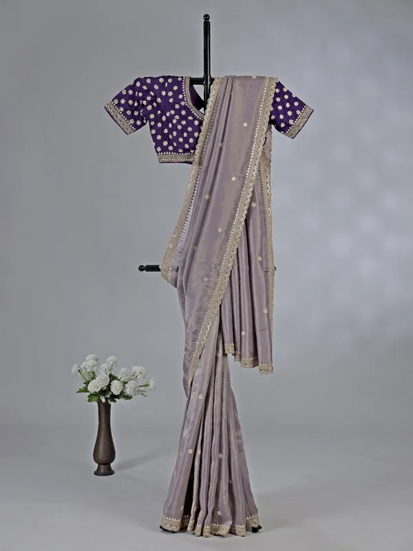 Pastel purple dola silk saree with sparkle work