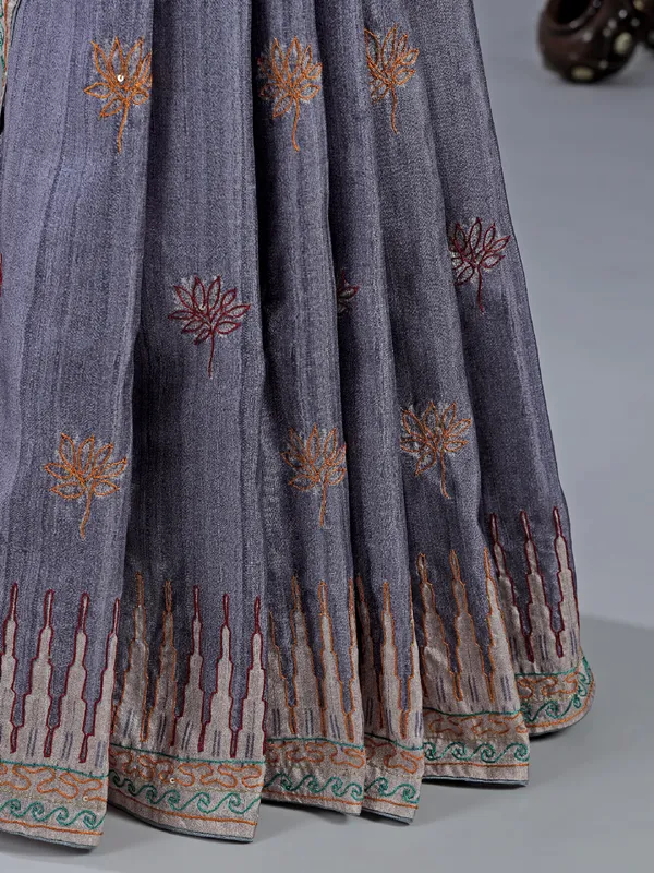 Pastel purple silk saree with classic thread work