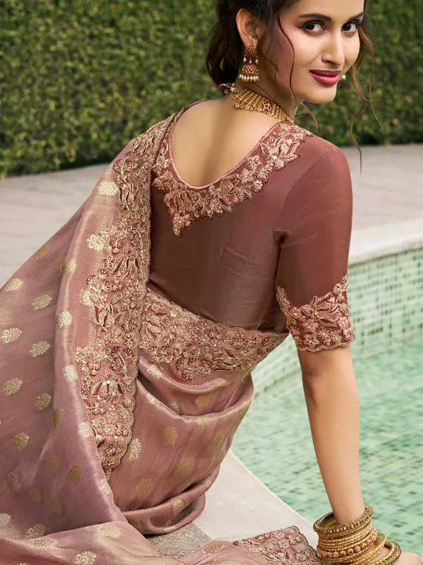Pastel purple tissue silk saree for grand celebrations