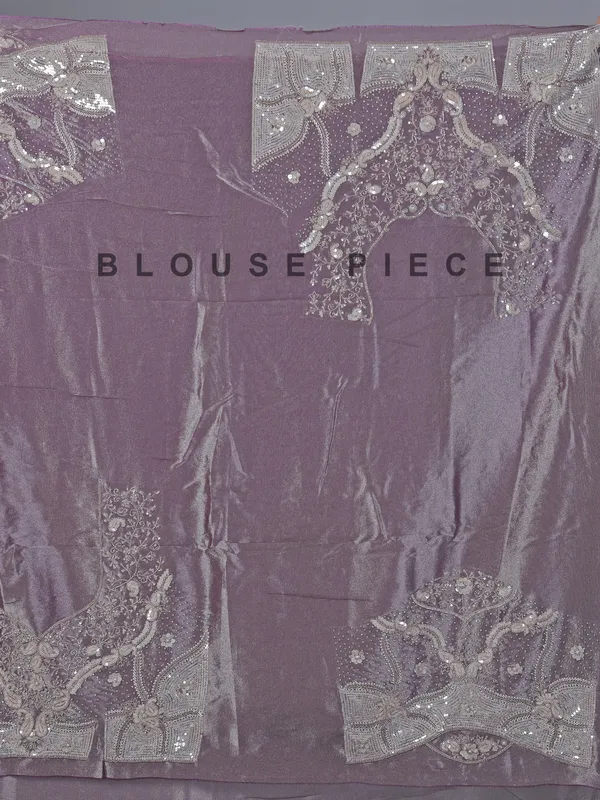 Pastel purple tissue silk saree with heavy work