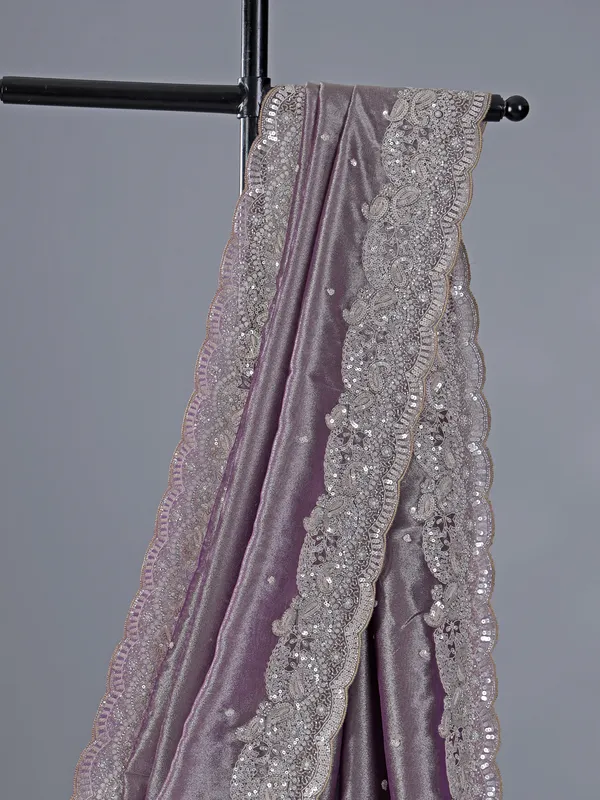 Pastel purple tissue silk saree with heavy work