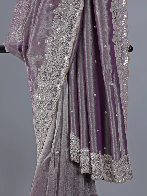 Pastel purple tissue silk saree with heavy work