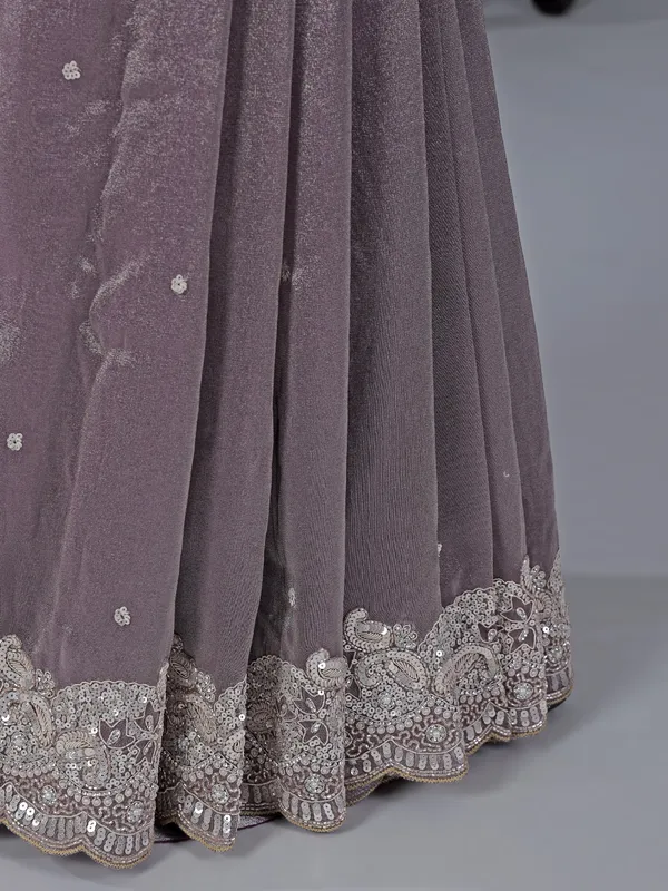 Pastel purple tissue silk saree with heavy work