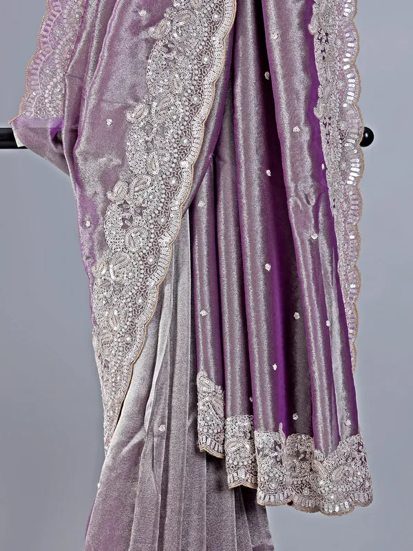 Pastel purple tissue silk saree with heavy work