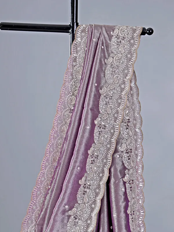 Pastel purple tissue silk saree with heavy work