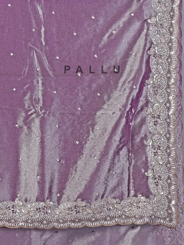 Pastel purple tissue silk saree with heavy work