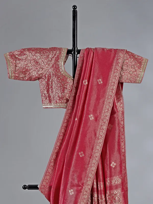 Pastel red dola silk saree with zari sparkle