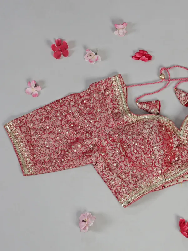 Pastel red dola silk saree with zari sparkle